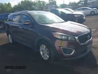 2018 Kia Sorento LX with VIN 5XYPG4A55JG357651, listed as a IAAI auction lot 42650880 with 122,723 mi miles and . Bid and sale history available at DreamBid. Image 1.