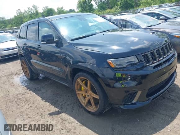 2018 Jeep Grand Cherokee Trackhawk with VIN 1C4RJFN96JC293806, listed as a IAAI auction lot 42503526 with 42,666 mi miles and . Bid and sale history available at DreamBid. Image 1.