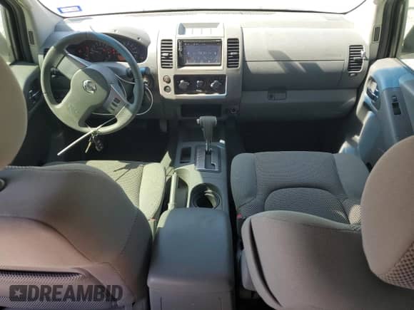 2006 Nissan Frontier LE with VIN 1N6AD07UX6C451894, listed as a Copart auction lot 87006705 with 61,685 mi miles and Salvage title. Bid and sale history available at DreamBid. Image 8.