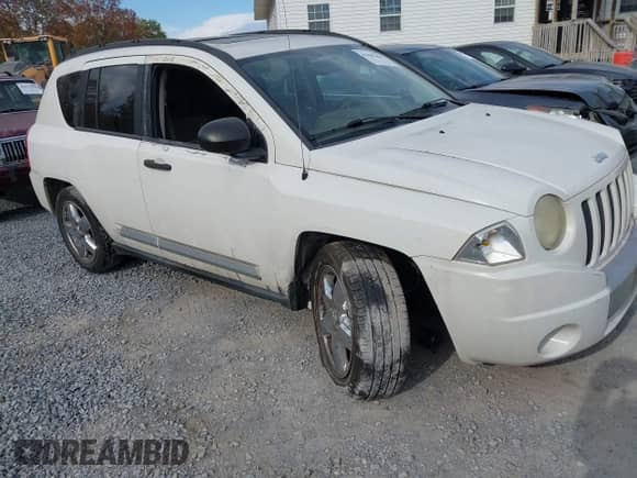 2007 Jeep Compass Limited with VIN 1J8FT57W87D108631, listed as a IAAI auction lot 43482463 with 157,157 mi miles and . Bid and sale history available at DreamBid. Image 1.
