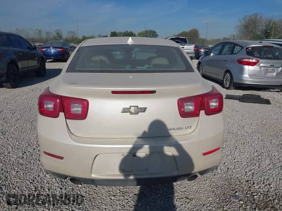2014 Chevrolet Malibu LTZ with VIN 1G11H5SL4EF155987, listed as a IAAI auction lot 43360908 with 181,331 mi miles and . Bid and sale history available at DreamBid. Image 16.