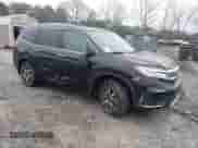 2022 Honda Pilot Touring 7-Passenger z VIN 5FNYF5H61NB013372, wystawiony jako IAAI lot #41595890 z przebiegiem 53 664 mil mil oraz . Historia ofert i sprzedaży dostępna na DreamBid. Obrazek 1.