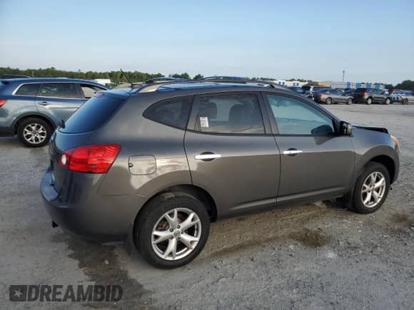 2010 Nissan Rogue SL with VIN JN8AS5MT0AW013009, listed as a Copart auction lot 69099655 with 106,273 mi miles and Salvage title. Bid and sale history available at DreamBid. Image 3.