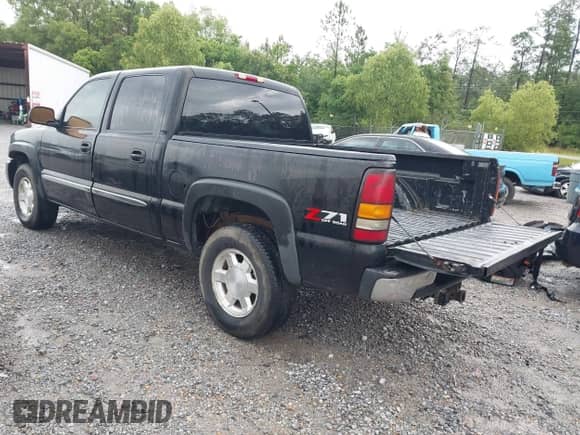 2004 GMC Sierra 1500 SLE with VIN 2GTEK13T941334257, listed as a IAAI auction lot 42199192 with 180,166 mi miles and . Bid and sale history available at DreamBid. Image 3.