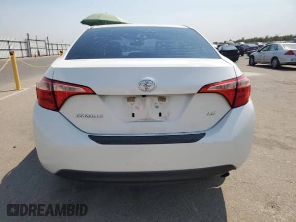 2019 Toyota Corolla LE with VIN 5YFBURHE9KP938993, listed as a Copart auction lot 71037945 with 71,852 mi miles and Salvage title. Bid and sale history available at DreamBid. Image 6.