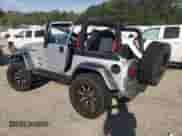 2003 Jeep Wrangler Rubicon с VIN 1J4FA69S53P375189, выставлен на аукционе Copart как лот 54292035 с пробегом 55 863 миль миль и Списание • Salvage title. История ставок и продаж доступна на DreamBid. Изображение 2.