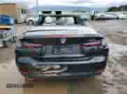 2022 BMW 4 Series 430i with VIN WBA23AT03NCJ32884, listed as a Copart auction lot 48077065 with 12,910 mi miles and Salvage title. Bid and sale history available at DreamBid. Image 6.