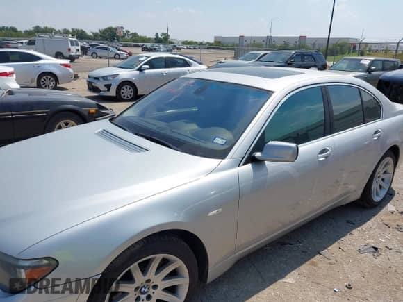 2004 BMW 7 Series 745i with VIN WBAGL63504DP73708, listed as a IAAI auction lot 43202611 with 193,110 mi miles and . Bid and sale history available at DreamBid. Image 6.
