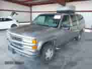 1999 Chevrolet Suburban with VIN 1GNFK16R0XJ516287, listed as a IAAI auction lot 43561423 with 264,526 mi miles and . Bid and sale history available at DreamBid. Image 2.