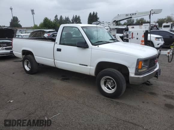 1997 GMC Sierra 1500 z VIN 1GTEK14W6VZ549578, wystawiony jako Copart lot #67808705 z przebiegiem 203 467 mil mil oraz Czysty tytuł • Clean title. Historia ofert i sprzedaży dostępna na DreamBid. Obrazek 4.