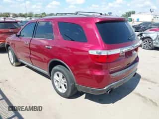 2013 Dodge Durango Crew with VIN 1C4SDJDT5DC565632, listed as a IAAI auction lot 43414719 with 130,151 mi miles and . Bid and sale history available at DreamBid. Image 3.