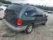 1997 Dodge Caravan SE z VIN 2B4GP44R4VR202585, wystawiony jako Copart lot #68703985 z przebiegiem 188 500 mil mil oraz Szkoda całkowita • Salvage title. Historia ofert i sprzedaży dostępna na DreamBid. Obrazek 3.