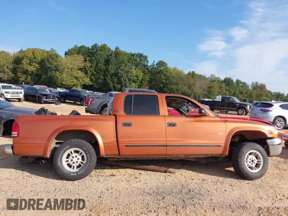 2000 Dodge Dakota with VIN 1B7GG2AX8YS720132, listed as a IAAI auction lot 43274898 with 139,546 mi miles and . Bid and sale history available at DreamBid. Image 13.