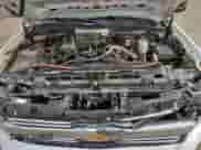 2015 Chevrolet Silverado 2500HD Work Truck z VIN 1GC1KUE81FF569806, wystawiony jako Copart lot #90887985 z przebiegiem 160 674 mil mil oraz Czysty tytuł • Clean title. Historia ofert i sprzedaży dostępna na DreamBid. Obrazek 11.