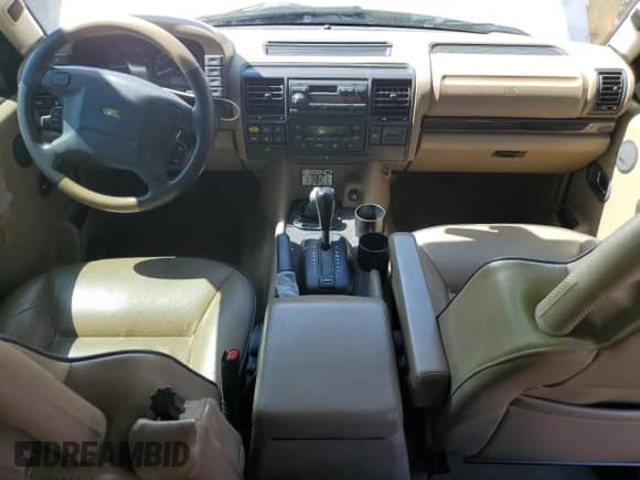 2000 Land Rover Discovery Cloth with VIN SALTY1549YA276568, listed as a Copart auction lot 66630435 with 134,486 mi miles and Salvage title. Bid and sale history available at DreamBid. Image 8.