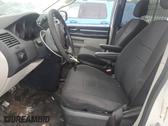 2010 Dodge Grand Caravan Cargo with VIN 2D4CN1AEXAR377301, listed as a Copart auction lot 71476774 with 125,421 mi miles and Salvage title. Bid and sale history available at DreamBid. Image 7.