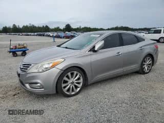2012 Hyundai Azera with VIN KMHFH4JG9CA134327, listed as a Copart auction lot 82285485 with 113,806 mi miles and Salvage title. Bid and sale history available at DreamBid. Image 1.