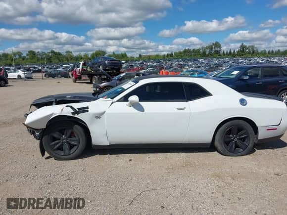 2017 Dodge Challenger SXT Plus with VIN 2C3CDZAG5HH605905, listed as a IAAI auction lot 43048856 with 58,221 mi miles and . Bid and sale history available at DreamBid. Image 13.