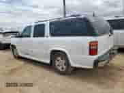 2001 Chevrolet Suburban LT with VIN 1GNEC16T11J223039, listed as a Copart auction lot 66936905 with 227,887 mi miles and Salvage title. Bid and sale history available at DreamBid. Image 2.