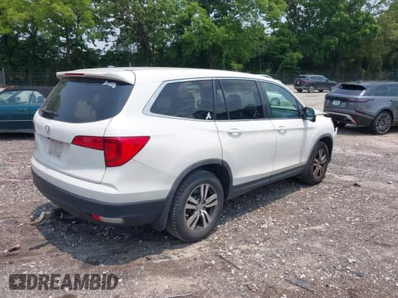 2017 Honda Pilot EX-L with VIN 5FNYF5H56HB003982, listed as a IAAI auction lot 42402297 with 99,485 mi miles and . Bid and sale history available at DreamBid. Image 4.