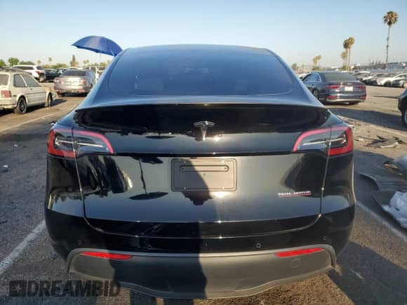2022 Tesla Model Y Performance with VIN 7SAYGDEF9NF393852, listed as a Copart auction lot 63141094 with 26,972 mi miles and Salvage title. Bid and sale history available at DreamBid. Image 6.