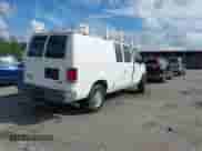 2013 Ford Econoline Cargo Commercial with VIN 1FTNE2EW0DDA41310, listed as a IAAI auction lot 43405112 with 185,163 mi miles and . Bid and sale history available at DreamBid. Image 4.