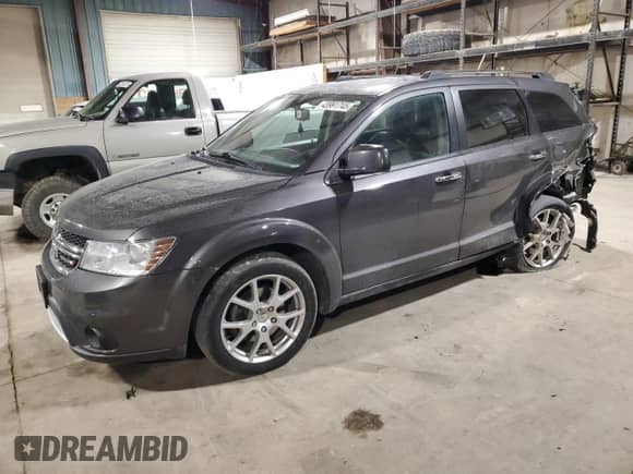 2015 Dodge Journey Limited с VIN 3C4PDDDG4FT689621, выставлен на аукционе Copart как лот 43991745 с пробегом 107 518 миль миль и Списание • Salvage title. История ставок и продаж доступна на DreamBid. Изображение 1.