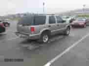 1999 Chevrolet Blazer LT with VIN 1GNCS13W9X2158646, listed as a IAAI auction lot 43550215 with 263,700 mi miles and . Bid and sale history available at DreamBid. Image 4.