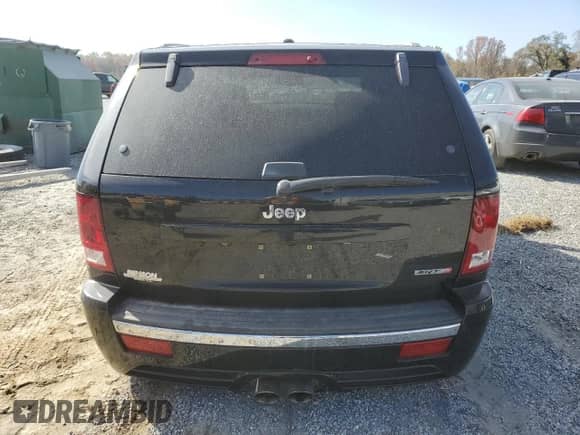 2008 Jeep Grand Cherokee SRT-8 z VIN 1J8HR78328C138609, wystawiony jako Copart lot #75389454 z przebiegiem 125 550 mil mil oraz Nie do naprawy • Non repairable. Historia ofert i sprzedaży dostępna na DreamBid. Obrazek 6.