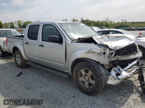 2005 Nissan Frontier SE с VIN 1N6AD07U75C437921, выставлен на аукционе Copart как лот 52987065 с пробегом 212 428 миль миль и Списание • Salvage title. История ставок и продаж доступна на DreamBid. Изображение 4.