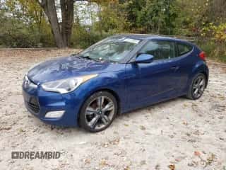 2016 Hyundai Veloster z VIN KMHTC6AD6GU302528, wystawiony jako Copart lot #82413955 z przebiegiem 119 865 mil mil oraz Czysty tytuł • Clean title. Historia ofert i sprzedaży dostępna na DreamBid. Obrazek 1.
