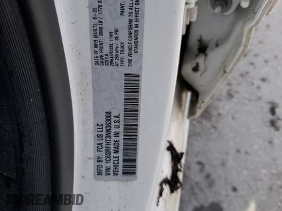 2022 Ram 1500 Limited z VIN 1C6SRFHT3NN363068, wystawiony jako Copart lot #58806965 z przebiegiem Nie podano mil oraz Szkoda całkowita • Salvage title. Historia ofert i sprzedaży dostępna na DreamBid. Obrazek 12.