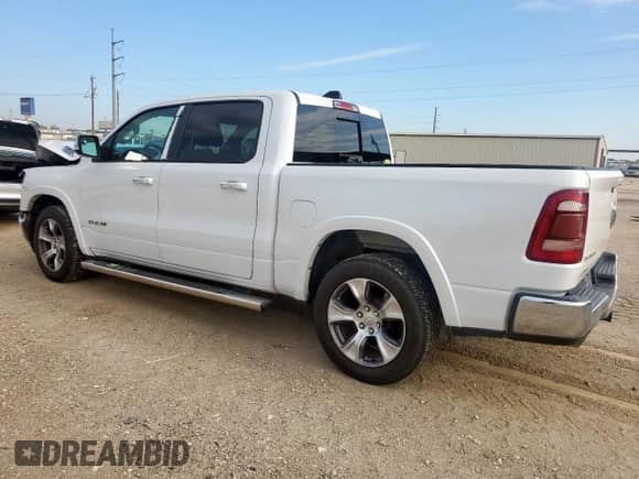 2019 Ram 1500 Laramie с VIN 1C6RREJT9KN684059, выставлен на аукционе Copart как лот 71441845 с пробегом 106 478 миль миль и Списание • Salvage title. История ставок и продаж доступна на DreamBid. Изображение 2.