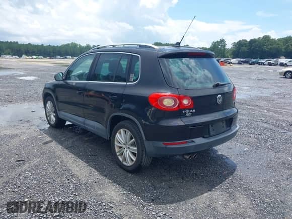 2011 Volkswagen Tiguan S with VIN WVGAV7AX2BW549477, listed as a IAAI auction lot 42923494 with 96,348 mi miles and . Bid and sale history available at DreamBid. Image 3.
