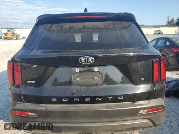 2021 Kia Sorento S с VIN 5XYRLDLC6MG005117, выставлен на аукционе Copart как лот 71847415 с пробегом 98 687 миль миль и Списание • Salvage title. История ставок и продаж доступна на DreamBid. Изображение 6.