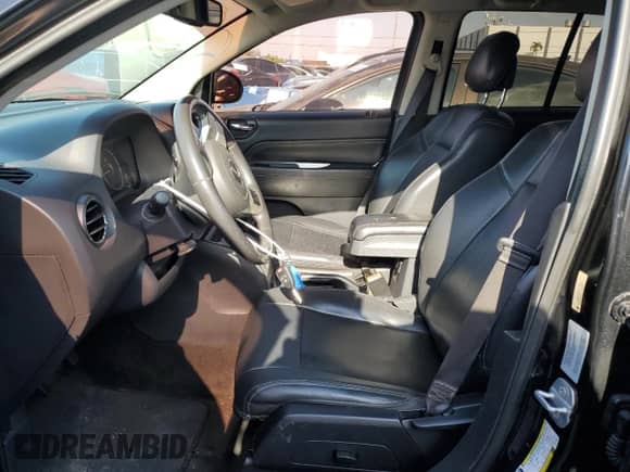 2015 Jeep Compass High Altitude with VIN 1C4NJCEA0FD178823, listed as a Copart auction lot 57904775 with 106,240 mi miles and Salvage title. Bid and sale history available at DreamBid. Image 7.
