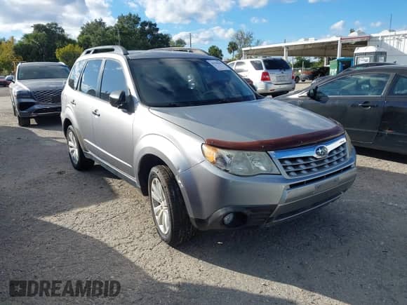 2011 Subaru Forester X Limited with VIN JF2SHAEC2BH705043, listed as a IAAI auction lot 43590646 with 193,422 mi miles and . Bid and sale history available at DreamBid. Image 6.