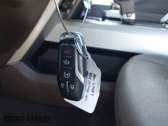 2015 Ford F-150 XLT z VIN 1FTEW1EG1FFD09157, wystawiony jako IAAI lot #42521350 z przebiegiem Nie podano mil oraz . Historia ofert i sprzedaży dostępna na DreamBid. Obrazek 11.