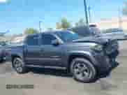 2016 Toyota Tacoma SR5 with VIN 3TMAZ5CNXGM009360, listed as a IAAI auction lot 43186084 with 89,490 mi miles and . Bid and sale history available at DreamBid. Image 14.