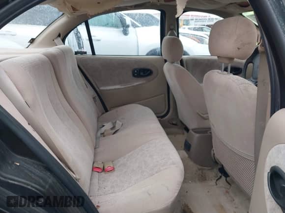 1999 Saturn SL z VIN 1G8ZK5272XZ263163, wystawiony jako IAAI lot #42180002 z przebiegiem 138 463 mil mil oraz . Historia ofert i sprzedaży dostępna na DreamBid. Obrazek 8.