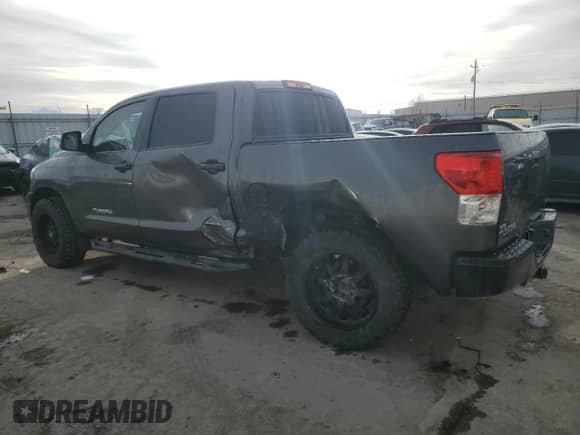 2013 Toyota Tundra z VIN 5TFDM5F16DX040275, wystawiony jako Copart lot #86436074 z przebiegiem 184 120 mil mil oraz Szkoda całkowita • Salvage title. Historia ofert i sprzedaży dostępna na DreamBid. Obrazek 2.