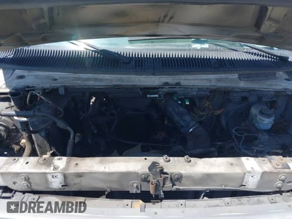 2002 Ford Econoline Cargo z VIN 1FTSE34L02HA30779, wystawiony jako IAAI lot #40210628 z przebiegiem 385 383 mil mil oraz . Historia ofert i sprzedaży dostępna na DreamBid. Obrazek 10.