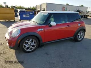 2013 MINI Hardtop S with VIN WMWSV3C59DT476400, listed as a Copart auction lot 85001915 with 176,944 mi miles and Salvage title. Bid and sale history available at DreamBid. Image 1.