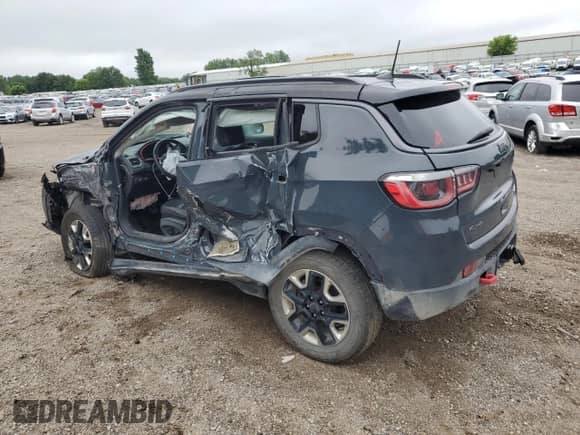 2017 Jeep Compass Trailhawk with VIN 3C4NJDDBXHT688190, listed as a Copart auction lot 63299085 with 104,758 mi miles and Clean title. Bid and sale history available at DreamBid. Image 2.