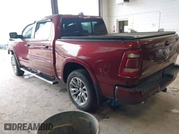 2019 Ram 1500 Laramie with VIN 1C6SRFJT6KN787172, listed as a IAAI auction lot 42407429 with 124,180 mi miles and . Bid and sale history available at DreamBid. Image 3.
