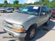 2000 Chevrolet Blazer LS z VIN 1GNCT18W6YK284227, wystawiony jako IAAI lot #42992936 z przebiegiem 155 138 mil mil oraz . Historia ofert i sprzedaży dostępna na DreamBid. Obrazek 17.