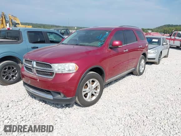2013 Dodge Durango Crew with VIN 1C4RDHDG0DC693142, listed as a IAAI auction lot 43154028 with 212,967 mi miles and . Bid and sale history available at DreamBid. Image 2.