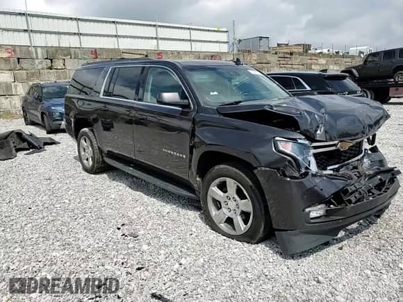 2017 Chevrolet Suburban LT с VIN 1GNSKHKC7HR286971, выставлен на аукционе Copart как лот 71402155 с пробегом 97 053 миль миль и Списание • Salvage title. История ставок и продаж доступна на DreamBid. Изображение 14.