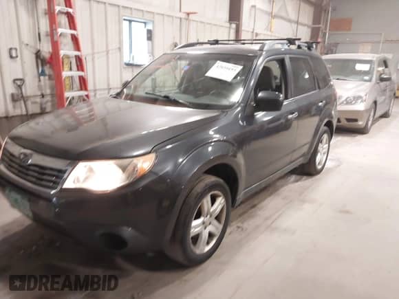 2009 Subaru Forester X z VIN JF2SH63639G784250, wystawiony jako IAAI lot #42839193 z przebiegiem 156 326 mil mil oraz . Historia ofert i sprzedaży dostępna na DreamBid. Obrazek 2.