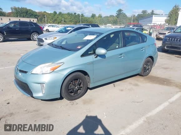 2013 Toyota Prius Two with VIN JTDKN3DU0D1657308, listed as a IAAI auction lot 43256774 with 238,587 mi miles and . Bid and sale history available at DreamBid. Image 2.